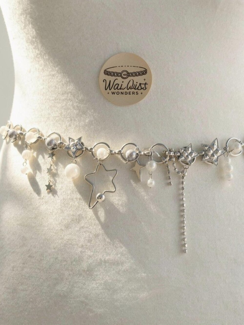 Y2k 2000s style Silver star and pearl belt with a boho vibe
